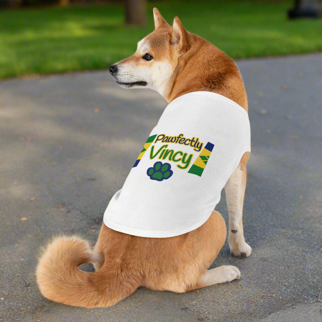 Dog wearing a white shirt with 'Pawfectly Vinny' text on a white background