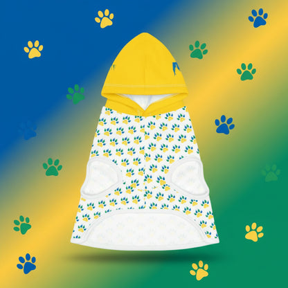 Yellow hooded towel with paw print pattern on a gray background