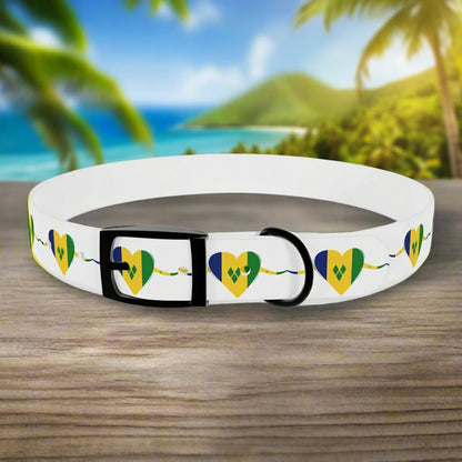 White dog collar with heart-shaped designs on a wooden surface with a blurred natural background