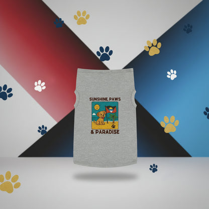 Gray tank top with 'Sunshine Paws & Paradise' design on a beach with palm trees and blue sky.