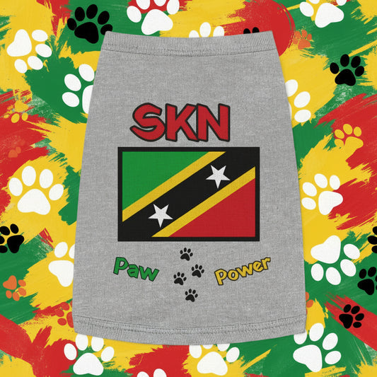 Gray pet skirt with Saint Kitts and Nevis flag design on a pink background with green leaves.