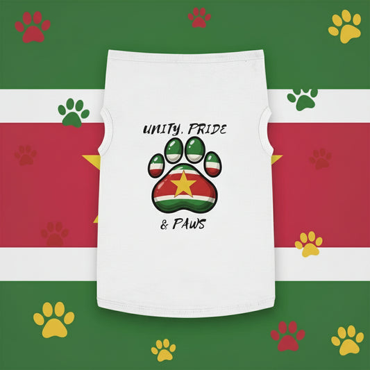 White tank top with a paw print design and text on a green leafy background