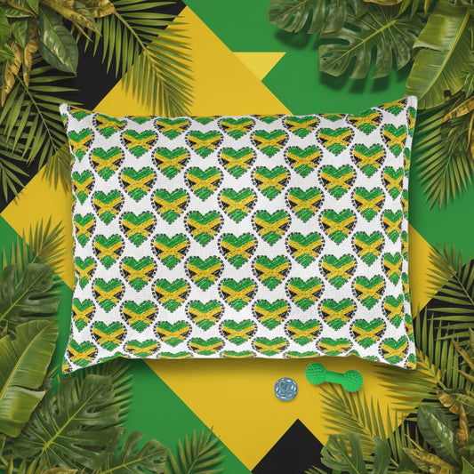 Pillow with heart pattern on a green and yellow background with leaves