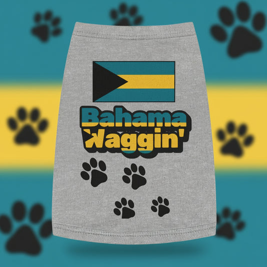 Gray pet dress with Bahama Waggin' text and paw prints on a blurred tropical background