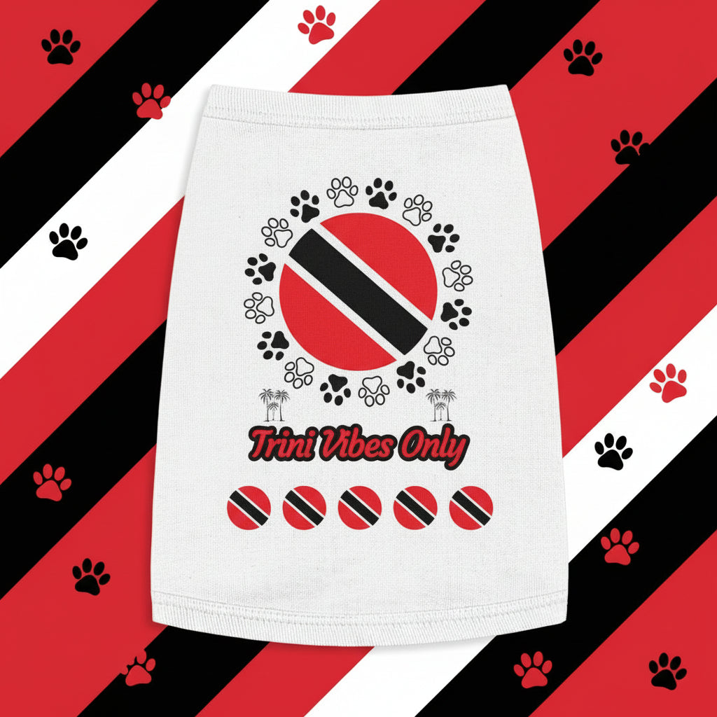 White towel with Trini flag design and 'Trini Vibes Only' text on a wooden surface with green leaves.