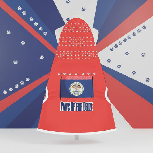 Red sleeveless shirt with paw prints and text on a beach with palm trees