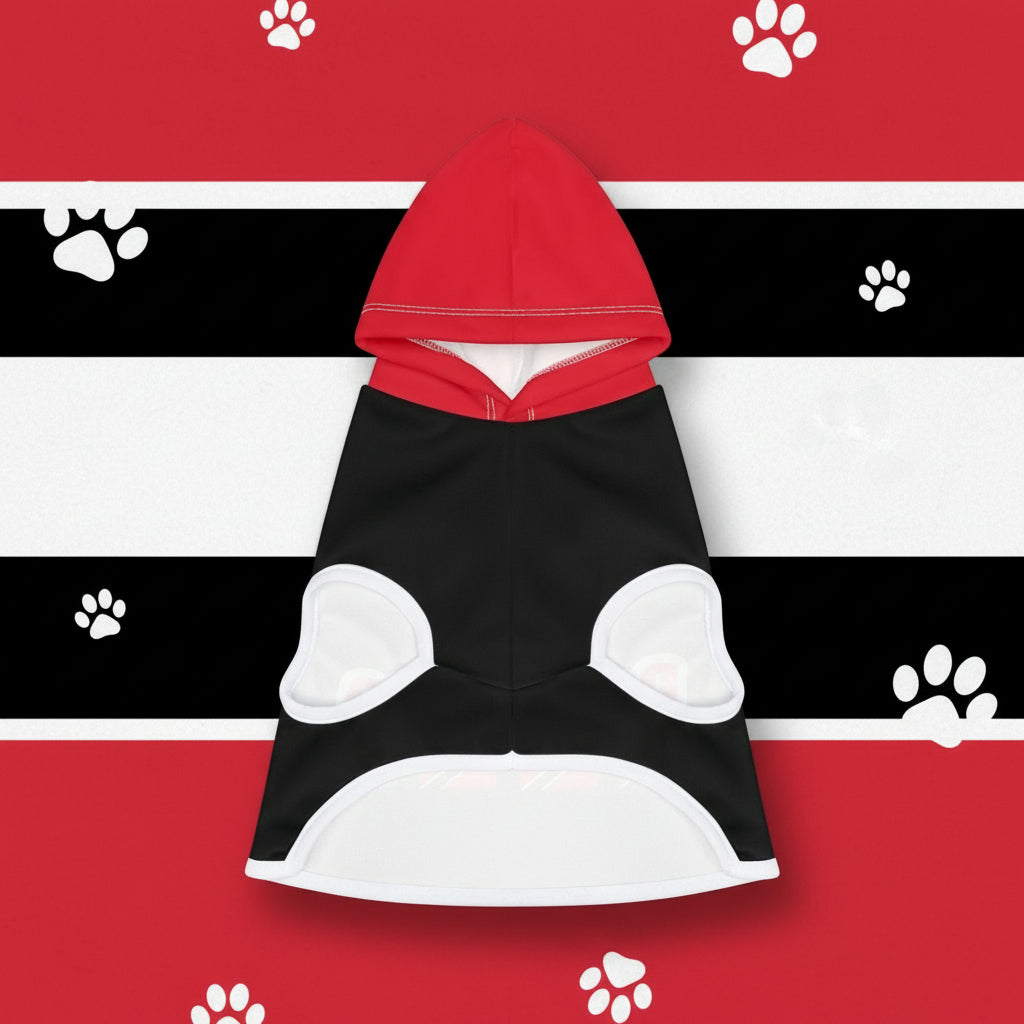 Black and white dog hoodie with red hood on a white background