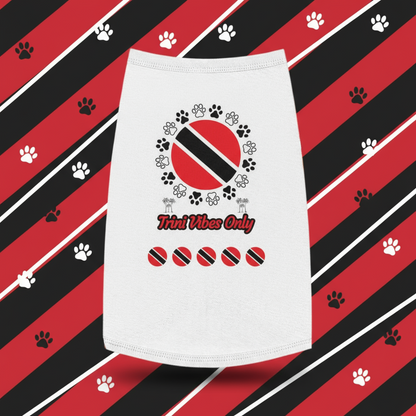 White towel with Trinidad and Tobago flag design and 'Trini Vibes Only' text on a gray background with green leaves.