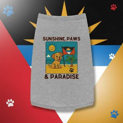 Gray dog shirt with a beach-themed design on a sandy surface