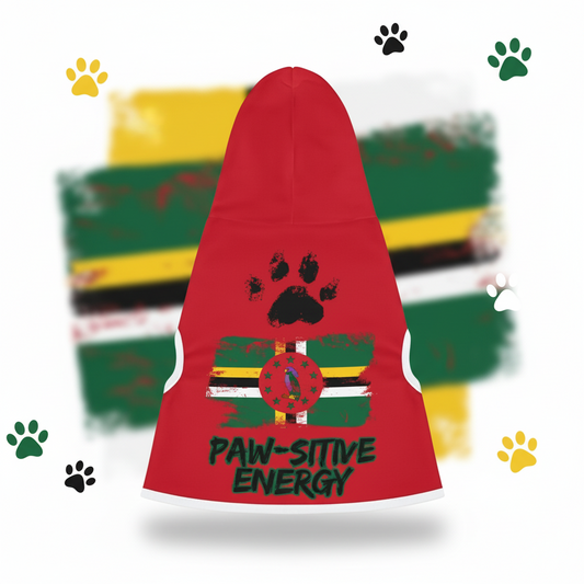 Red pet hoodie with paw prints and 'Paw-sitive Energy' text against a blurred green outdoor background